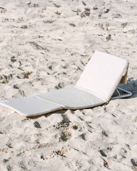 Portable beach loungers set up on Tallow Beach